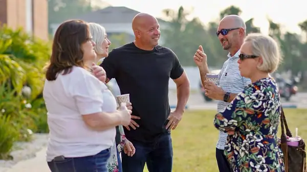 Friends talking together outside after church